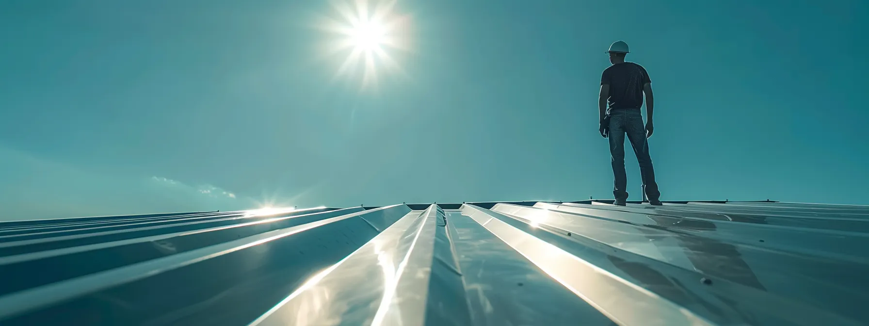 a professional standing on a newly installed metal roof in florida, carefully inspecting the shiny, weather-resistant surface under the bright sun.