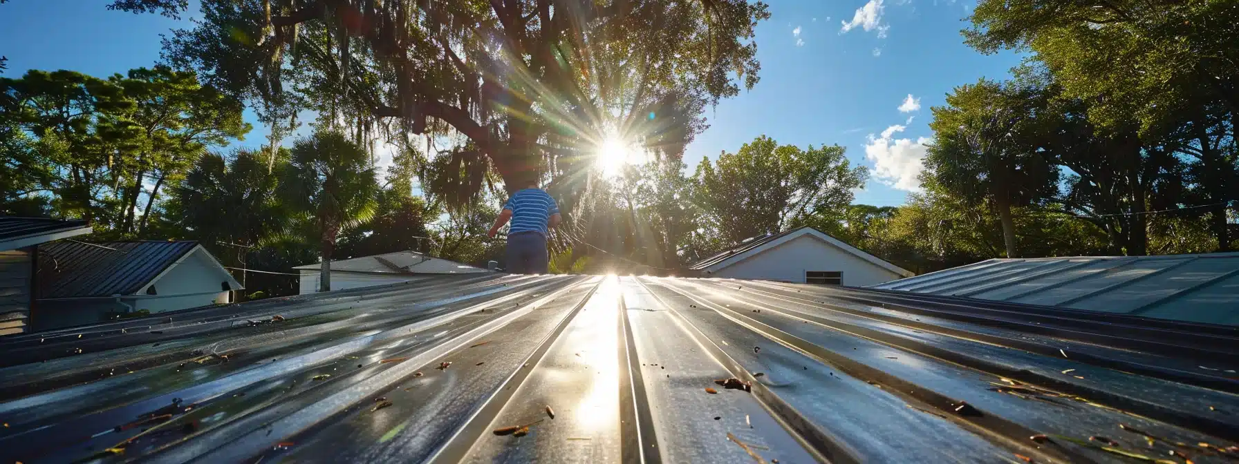 a skilled roofer inspecting a shiny, well-maintained sealed metal roof under the bright florida sun.